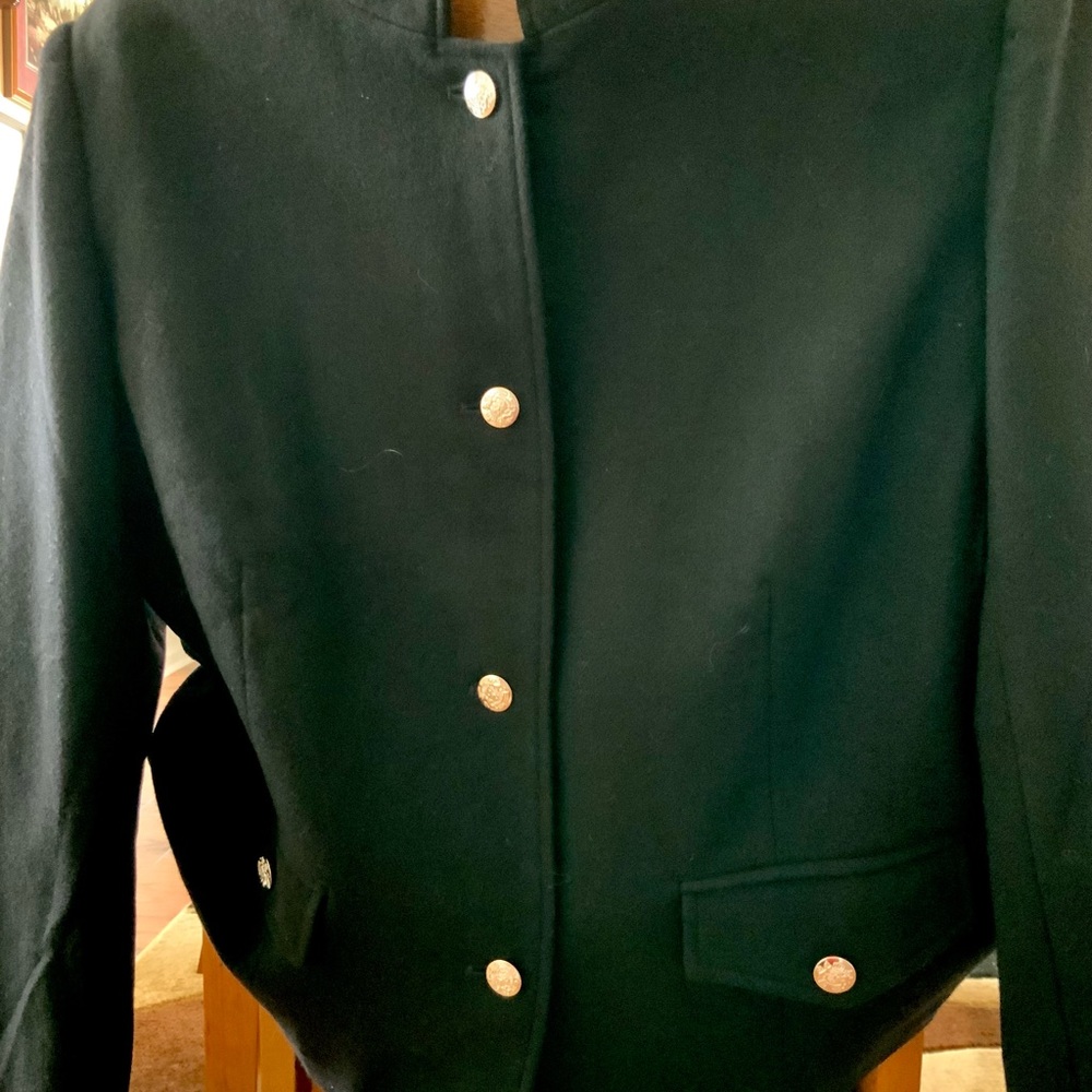 Women’s black jacket with silver buttons